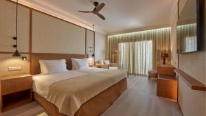 PortoBay Blue Ocean客房内的一张或多张床位
