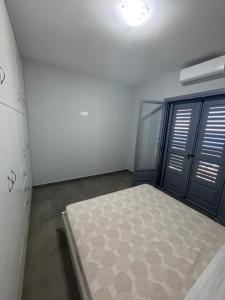 Postel nebo postele na pokoji v ubytování Three Olive Homes