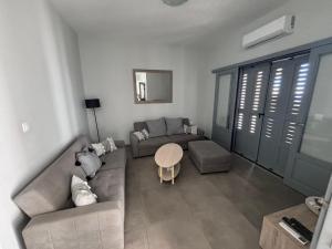 Posezení v ubytování Three Olive Homes