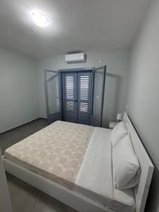 Postel nebo postele na pokoji v ubytování Three Olive Homes