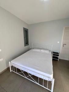Postel nebo postele na pokoji v ubytování Three Olive Homes