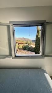 Postel nebo postele na pokoji v ubytování Three Olive Homes