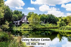 a house in the middle of a river at Chic 2BR- Pool,Gym,Pkng,Near BOK Ctr&Arts Dstrct in Tulsa