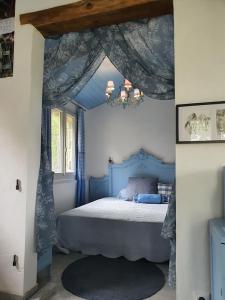 Ένα ή περισσότερα κρεβάτια σε δωμάτιο στο Holidayhomepoujol 2 persons