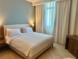Postel nebo postele na pokoji v ubytování Phoenix Hotel & Wellness