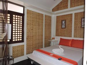 Krevet ili kreveti u jedinici u okviru objekta Orange Mangrove Pension House
