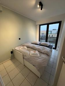 Postel nebo postele na pokoji v ubytování C- view Palace