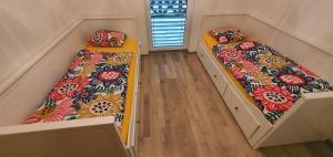 Postel nebo postele na pokoji v ubytování MiniResort VITA NUOVA