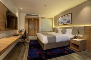 Postel nebo postele na pokoji v ubytování Best Western Plus Kathmandu