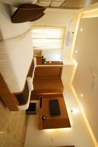 an overhead view of a bedroom with a bunk bed at Sukhi A Luxury Stay Inn in Chikmagalūr