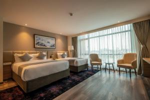 Postel nebo postele na pokoji v ubytování Best Western Plus Kathmandu