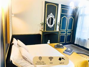Postel nebo postele na pokoji v ubytování Studio Royal Saint-Omer Centre