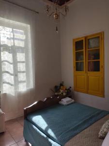 Katil atau katil-katil dalam bilik di Casa Violeta by 8essentially