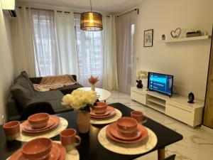 Televisyen dan/atau pusat hiburan di Delux 2 - Plovdiv Модерен апартамент до Стария град и Източната порта +5 gambar