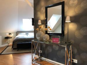 Postel nebo postele na pokoji v ubytování Boutique-Hotel Moseltor