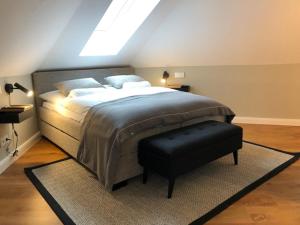Postel nebo postele na pokoji v ubytování Boutique-Hotel Moseltor