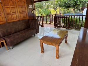 Balkón nebo terasa v ubytování สวนภาวัฒน์ - Pawat Waterfront & Resort + 5 fotografií