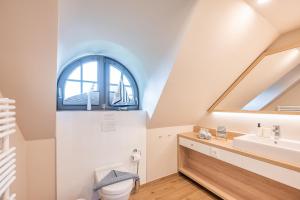 Ένα μπάνιο στο Ferienhaus Herrlich 01 Feriendorf Klein Stresow Rügen by ruyastay +43 φωτογραφίες