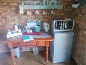 Køkken eller tekøkken på KINGFISHER BLUE on Milkwood