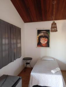 Postel nebo postele na pokoji v ubytování guesthouseparacuru