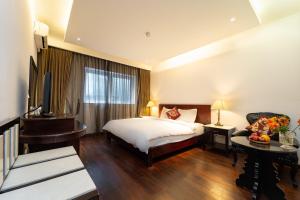 Postelja oz. postelje v sobi nastanitve Ha Noi Memory Central Hotel And Spa