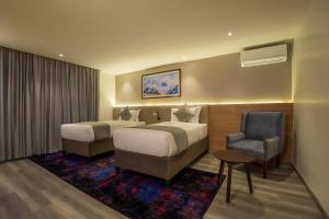 Postel nebo postele na pokoji v ubytování Best Western Plus Kathmandu
