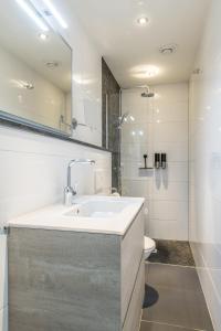 Koupelna v ubytování Hotel Oranjestaete