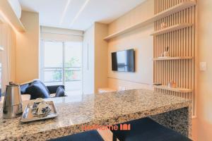Μια τηλεόραση ή/και κέντρο ψυχαγωγίας στο Studio em Cotia completo com boa localização +10 φωτογραφίες