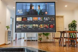 TV a/nebo společenská místnost v ubytování Jinxin-Tianlun Garden