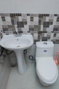 Koupelna v ubytování Sameer Homestay