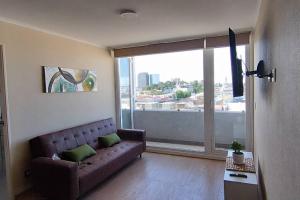 Posezení v ubytování departamento céntrico amplio y cómodo
