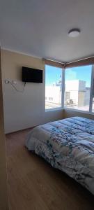 Postel nebo postele na pokoji v ubytování departamento céntrico amplio y cómodo