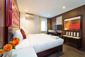 Postelja oz. postelje v sobi nastanitve Ha Noi Memory Central Hotel And Spa