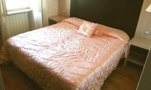 Postel nebo postele na pokoji v ubytování Hotel Garibaldi