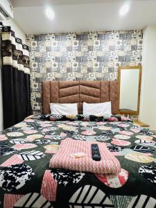 Postel nebo postele na pokoji v ubytování Hotel Divine inn