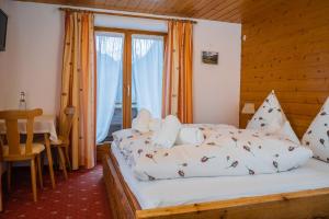 Postel nebo postele na pokoji v ubytování Frühstückspension Gweil
