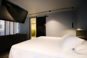 Postel nebo postele na pokoji v ubytování Hostel Joy Calle 85