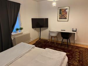TV a/nebo společenská místnost v ubytování Casa Bella