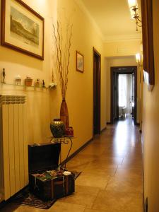 TV a/nebo společenská místnost v ubytování B&B La Dimora Di Nettuno