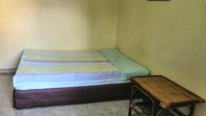 Postel nebo postele na pokoji v ubytování Tientong Guesthouse