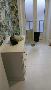 a room with a counter with a towel on it at F2 plages du débarquement rénové in Grandcamp-Maisy