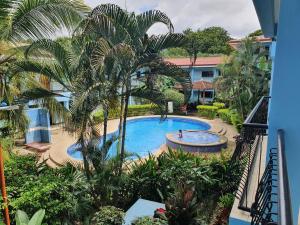an overhead view of a swimming pool in a resort at Marina Loft Studio 224 in Coco