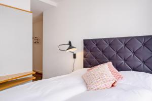 Postelja oz. postelje v sobi nastanitve Consum Boutique Hotel