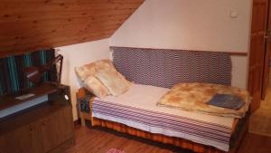 Кровать или кровати в номере Kerámiapark Guesthaus
