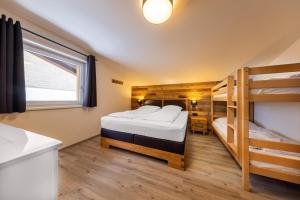 Postel nebo postele na pokoji v ubytování Haus Eckhausl Top 2 Hirsch
