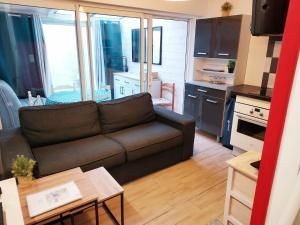 Køkken eller tekøkken på Appartement rez de jardin + 5 billeder