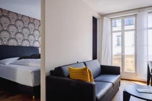 Postelja oz. postelje v sobi nastanitve Consum Boutique Hotel