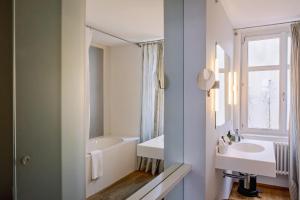 Koupelna v ubytování Consum Boutique Hotel + 21 fotografií