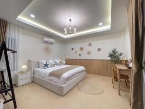 Postel nebo postele na pokoji v ubytování อุ่นไอเล Pool Villa Trat