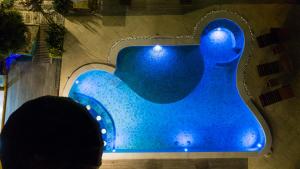 A piscina localizada em Paraíso Ecológico Pousada & SPA ou nos arredores